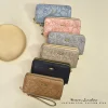 The new wallet for ladies is a stylish, long, large-capacity clutch bag with a high-end feel and good quality details Picture